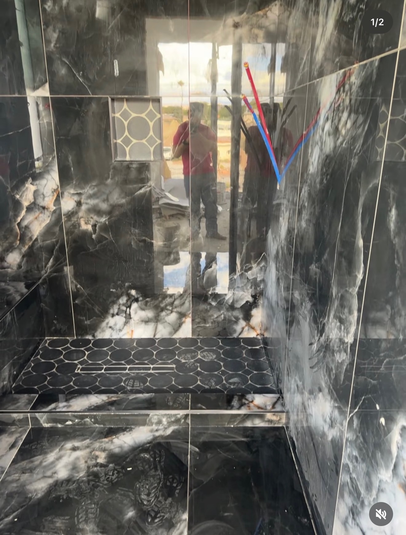 Custom black marble shower by BJR Development